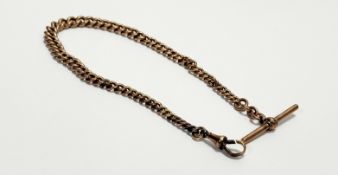 An Edwardian 9ct gold graduated curb link Albert with lobster claw fastening and t-bar: l. x 31.