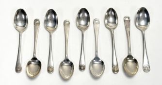 A George V set of nine fan shell terminal handled tea spoons: l. x 10.5cm Sheffield 1929 108.2cm