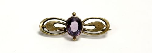 An Edwardian 9ct gold Art Nouveau style brooch set oval facet cut amethyst approximately 2ct in