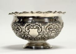 A late Victorian Sheffield silver scalloped floral chased table centre flower bowl: h. x 10cm d. x