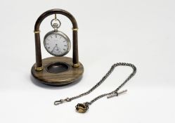 An Elgin USA steel cased open face pocket watch with white enamel dial, roman numerals and seconds