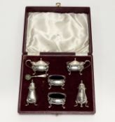 A Walker & Hall Sheffield epns six piece condinamet set to include a pair of mustards with Bristol
