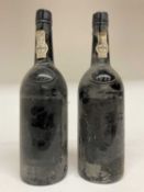 Two bottles, Dow's 1975 Port, lacking labels