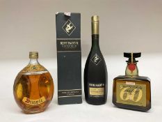 Three bottles comprising: Remy Martin Fine Champagne Cognac, 1 litre, boxed, Suntory Old Scotch Whis
