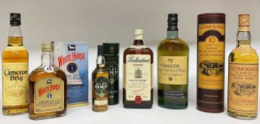 Six bottles of whisky: Glenmorangie 10 year old, 40%., 75cl., The Singleton 12cyear old, Ballantine'