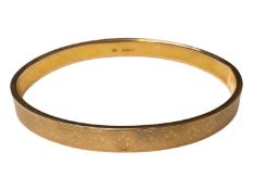 9ct gold bangle with engine turned decoration