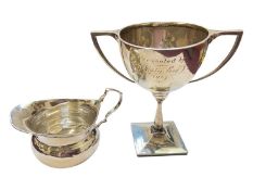 Edwardian silver cream jug and a 1920s silver two handled trophy with presentation engraving