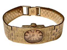 Vintage Chevalier 9ct gold ladies wristwatch with an integral 9ct gold bark effect articulated brace