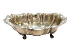 Continental silver oval dish with scalloped edge and paw feet, stamped 800