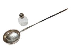 Georgian silver toddy ladle with a coin inset and a twisted whalebone handle and a glass pepperette