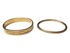 Two 18ct gold bangles