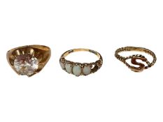 9ct gold single synthetic white stone ring, 9ct gold opal five stone ring (one stone missing) and a