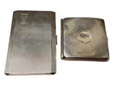 Two silver cigarette cases, both with engine turned decoration and engraved initials