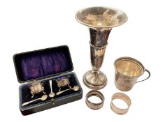 Group of silver to include a pair of salts with three salt spoons in fitted case, two napkin rings,
