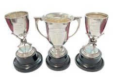 Three silver shooting trophies