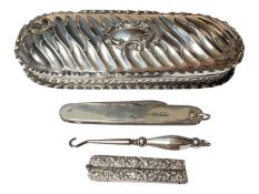 Victorian silver dressing table box (Birmingham 1894) containing a pair of silver mounted folding se