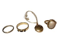 14ct gold and garnet three stone ring, 9ct gold and pearl dress ring, 9ct gold wedding ring and a 9c