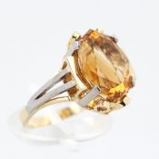 Damenring, 14 kt Gelbgold, teils Weißgold, mit 1 gelben, wohl Citrin, punziert, ca. 5,9 g, RM 53