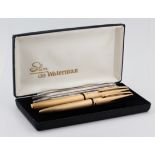 Schreibset Waterman, vergoldet, 1 Füller (Feder 18 kt Gelbgold), 1 Kugelschreiber, im original Etui,