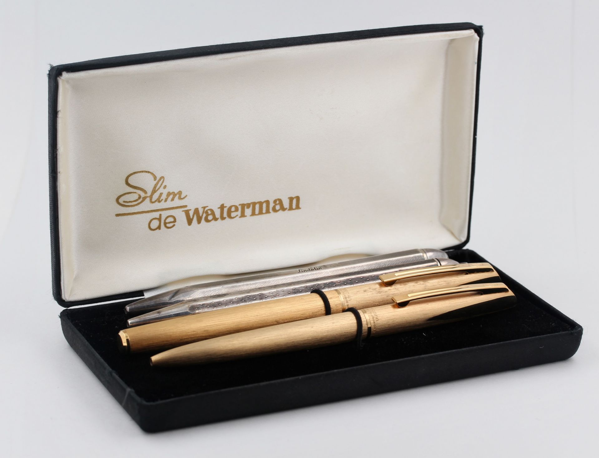Schreibset Waterman, vergoldet, 1 Füller (Feder 18 kt Gelbgold), 1 Kugelschreiber, im original Etui,