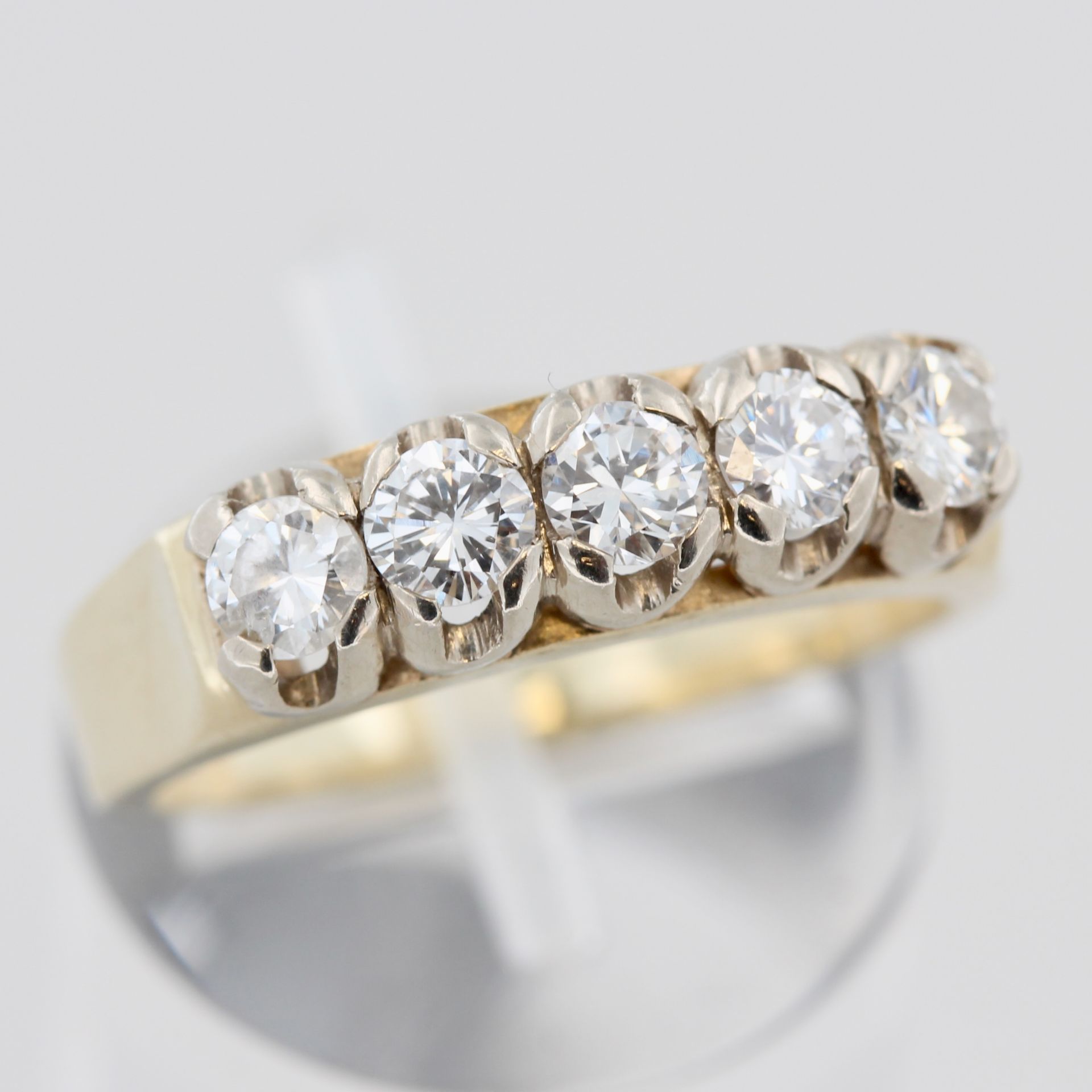 Damenring, 14 kt Gelbgold, mit 5 Brillanten, punziert, ca. 5,4 g, RM 56