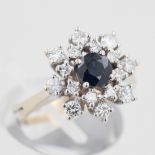 Damenring, 18 kt Weißgold, mit kleinen Brillanten und 1 wohl Saphir, punziert, ca. 5,2 g, RM 55
