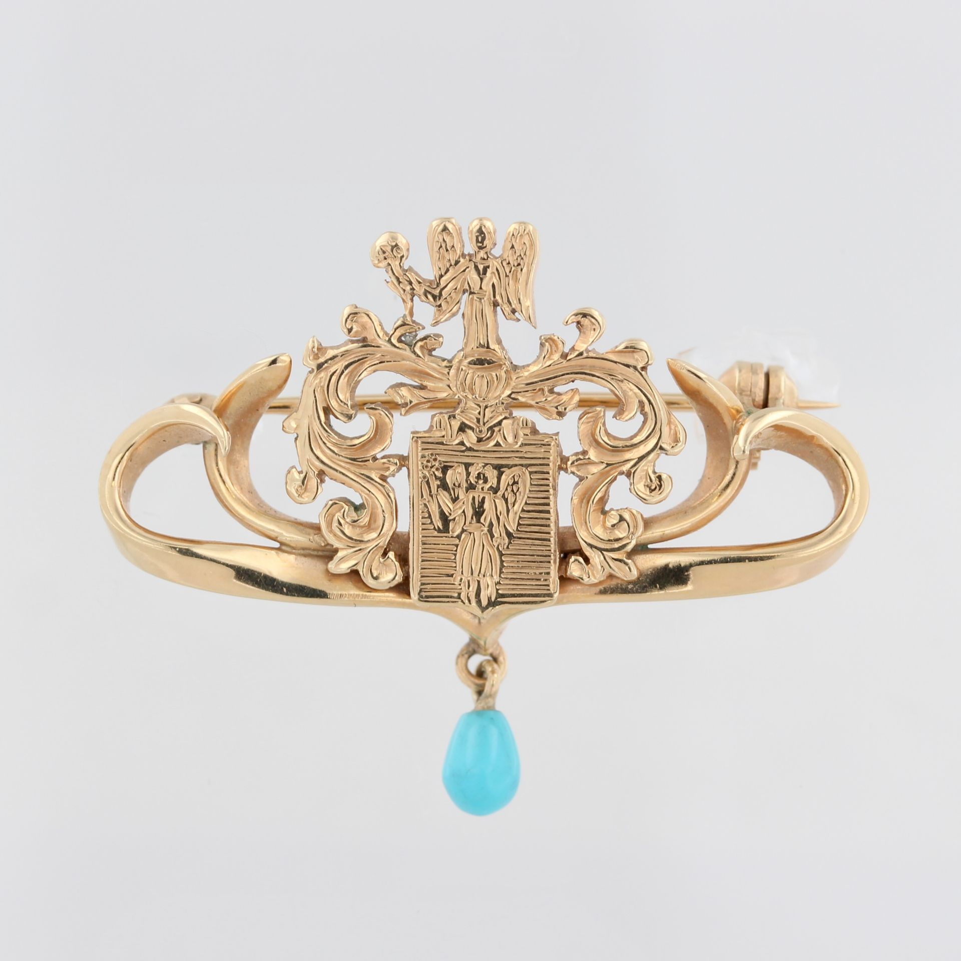 Brosche, 14 kt Gelbgold, mit 1 kleinen Türkis, Darstellung wohl des Erzengels Ariel, punziert,
