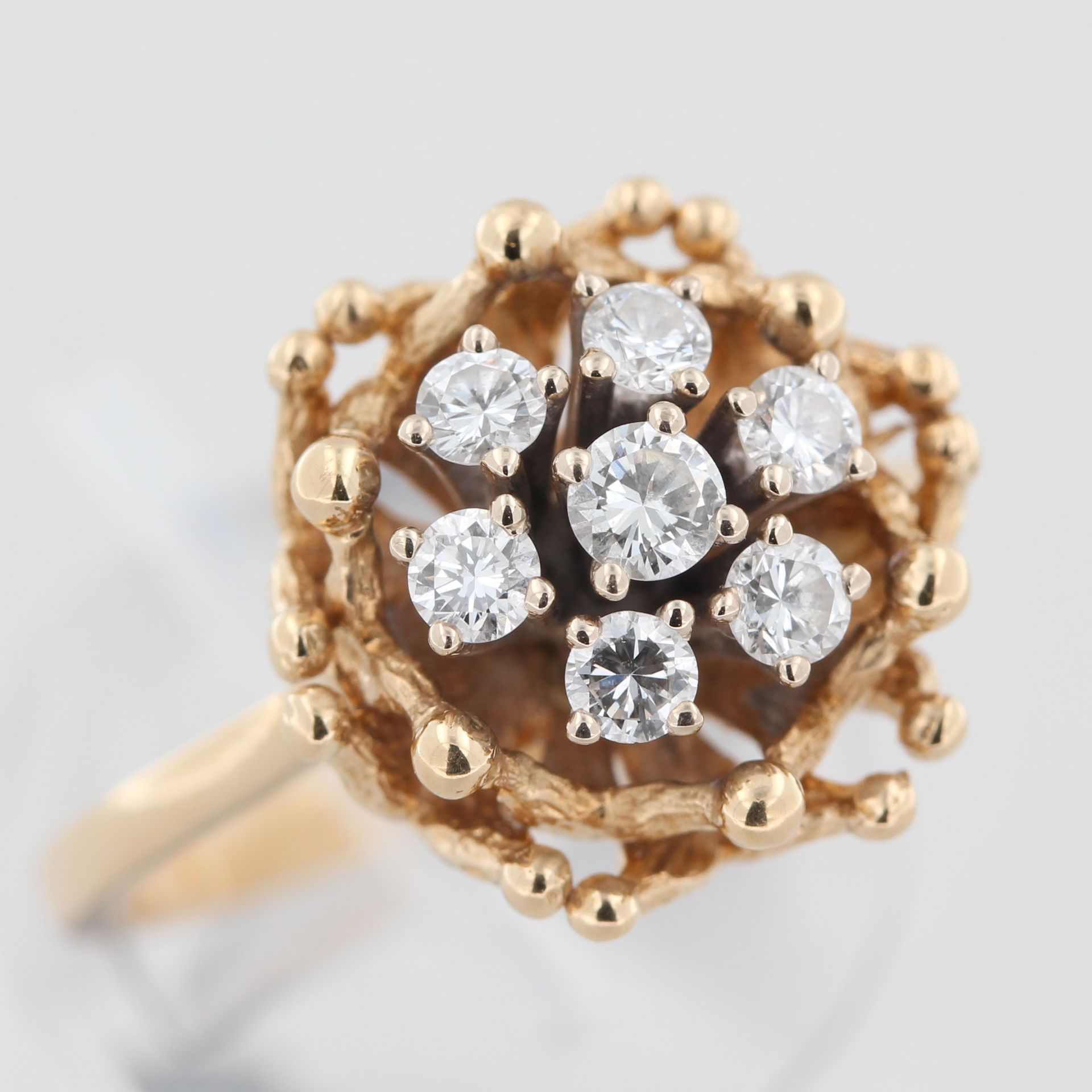Damenring, 18 kt Gelbgold, mit 7 kleinen Brillanten, punziert, ca. 7,5 g, RM 56