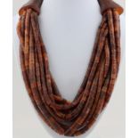 Collier, wohl Horn, 10-reihig, L. 52 cm