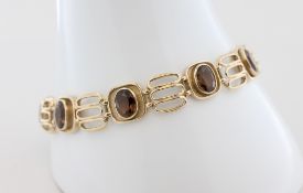 Armband Fries-Arauner, 14 kt Gelbgold, mit 9 wohl Topasen (Steine teils mit Gebrauchsspuren),