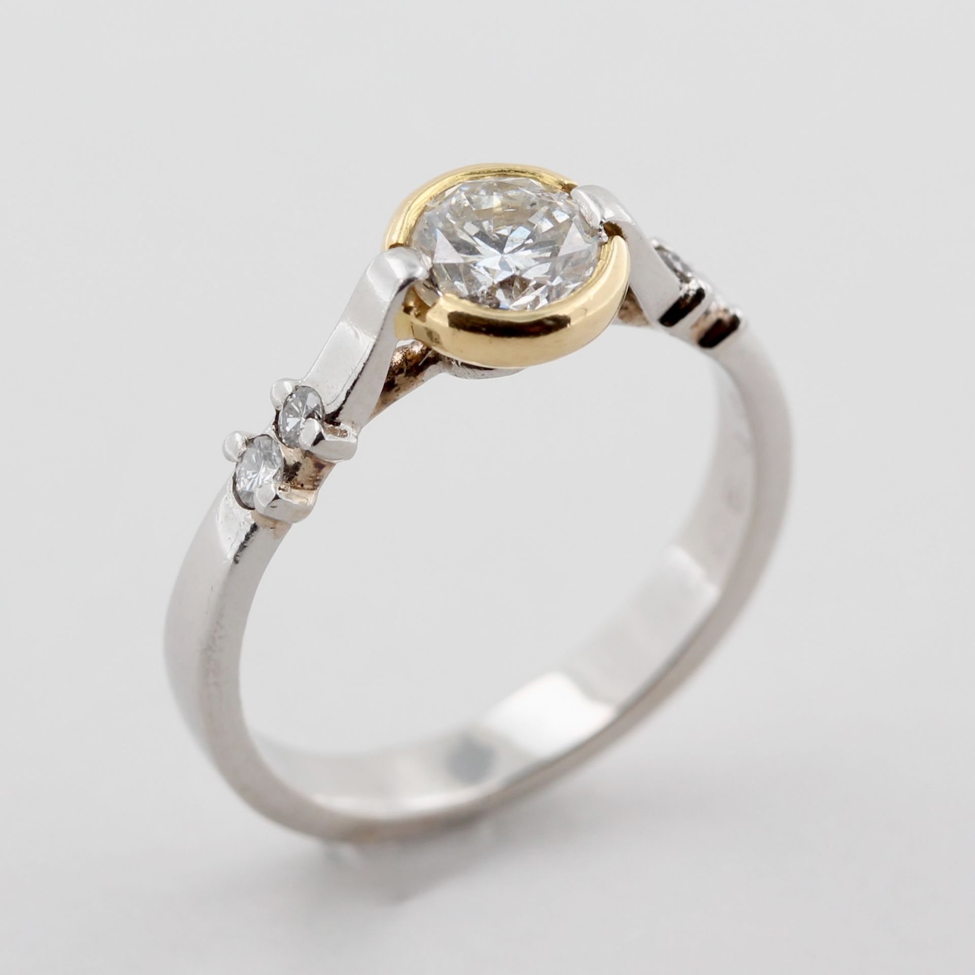Solitärring, 950 Platin, teils Gelbgold, mit 1 Brillant, ca. 0,60 ct, weiß, si, ca. 4,5 g, RM 51,5 - Bild 4 aus 4