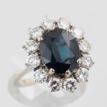 Damenring, 14 kt Weißgold, mit Brillanten und 1 wohl Saphir (leichter Spannungsriss innen),
