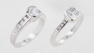 Zwei Silber Ringe, 925 Silber, mit weißen, wohl Zirkonia, zusammen ca. 7,3 g, RM 55 + 56