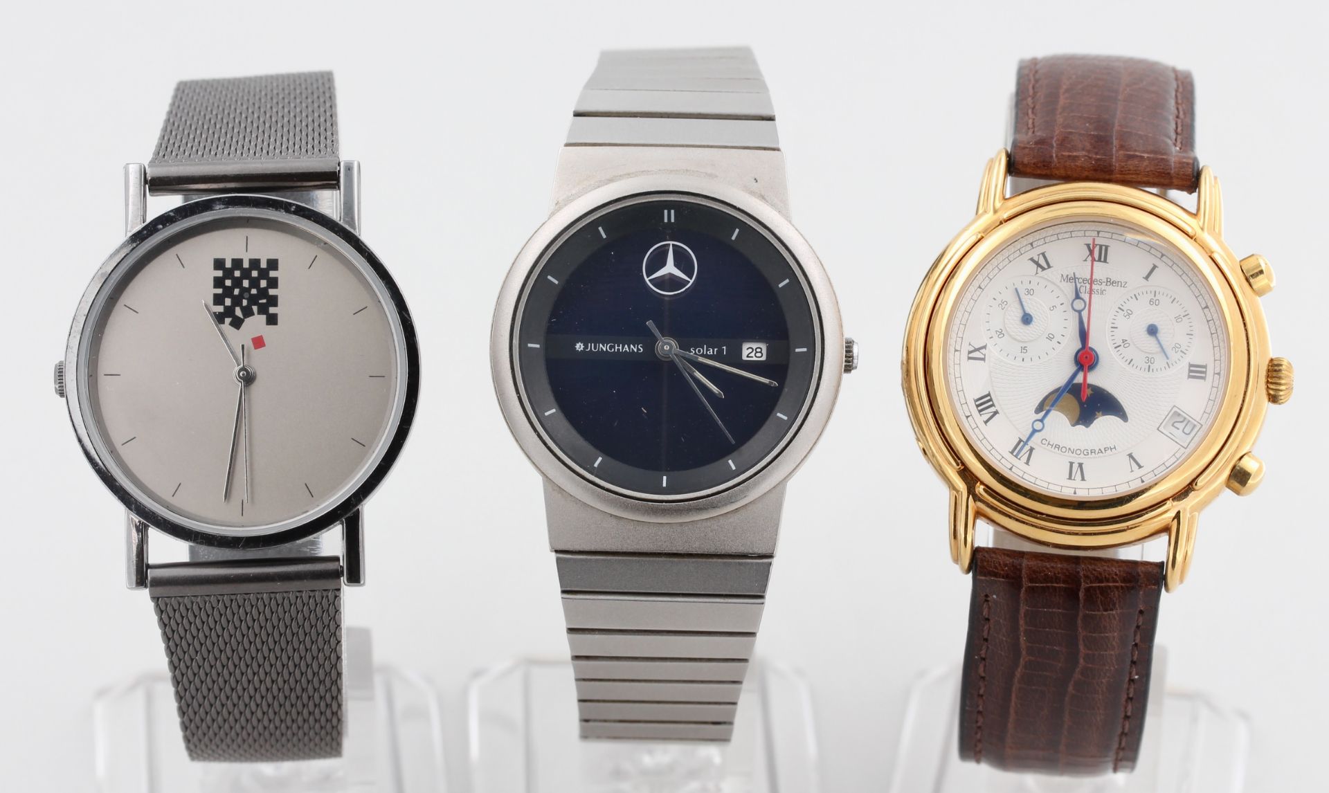 Konvolut Armbanduhren, Stahl, teilweise vergoldet, 1 x Junghans Solar 1 mit Mercedes Stern, 1 x