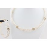 Schmuckset, 14 kt Gelbgold, Zwischenteile, teils mit kleinen Brillanten und Aquamarinen, punziert,