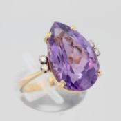 Damenring, 18 kt Gelbgold, mit 1 Amethyst und kleinen Diamanten, punziert, ca. 6,7 g, RM 56