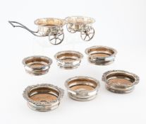 7 M.F. & Co. Silverplate Wine Wagons & Coasters