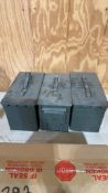 3 empty ammo boxes