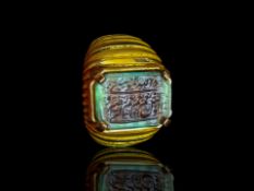 An Exceptional 16th century Mughal Gold and Emerald Quranic Personal Ring, Dated 1004 AH (1596 CE)