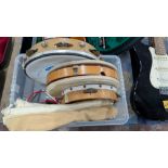 The contents of a Crate of Percussion Instruments. Including Tambourines, Triangle, Whistle, Recorde
