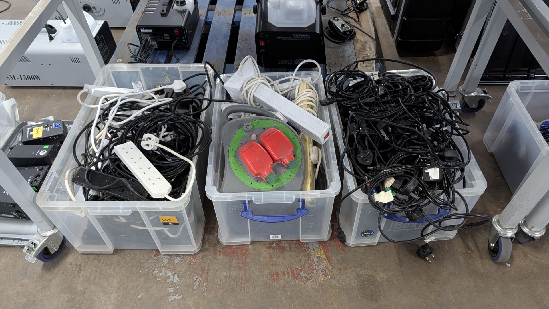 The contents of 3 Crates of Assorted Electrical Extension Cables, Power Cables and more.
