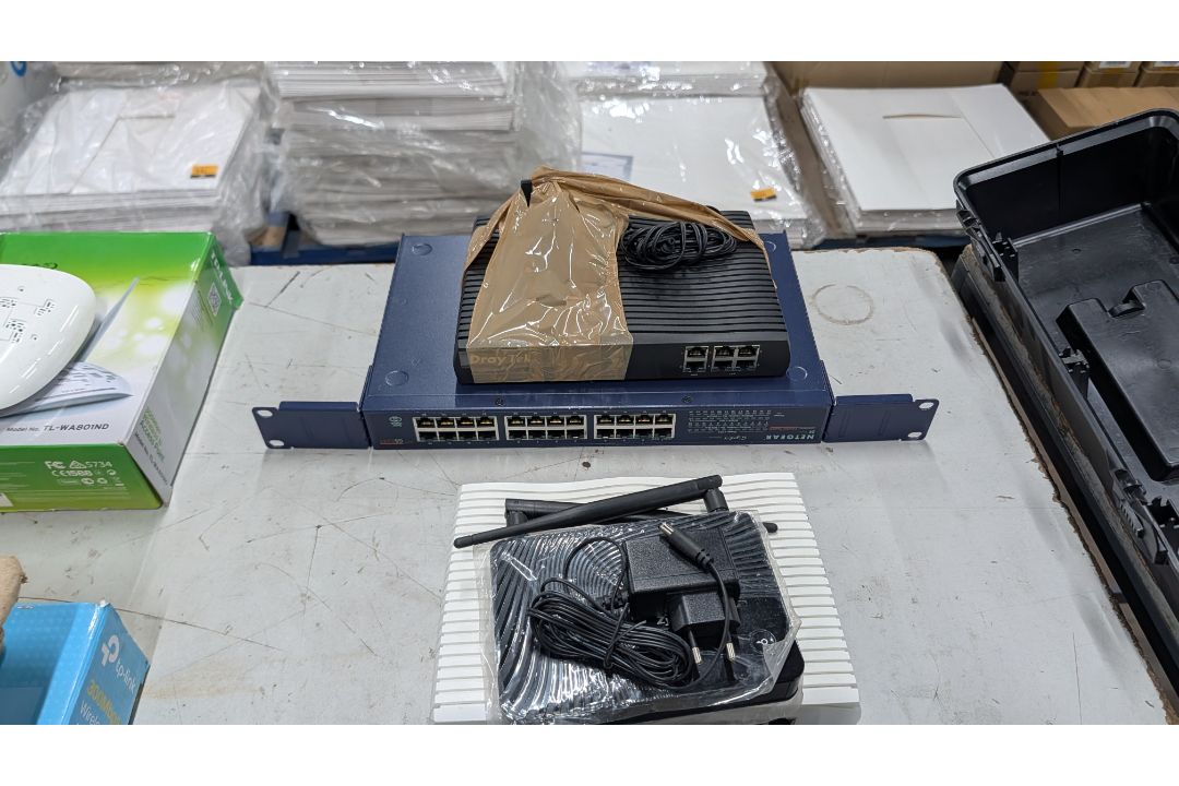 The contents of a Table of Assorted Switches, Routers and other Networking Items. - Image 7 of 19