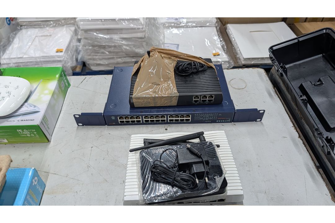 The contents of a Table of Assorted Switches, Routers and other Networking Items. - Image 8 of 19