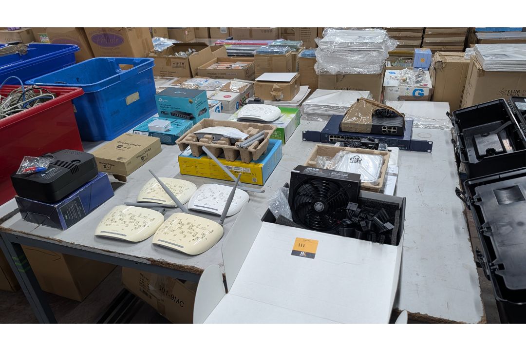 The contents of a Table of Assorted Switches, Routers and other Networking Items. - Image 1 of 19