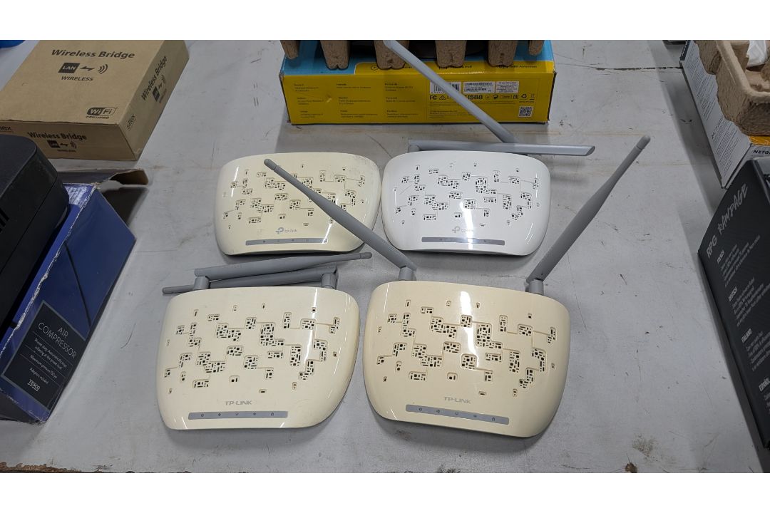 The contents of a Table of Assorted Switches, Routers and other Networking Items. - Image 10 of 19