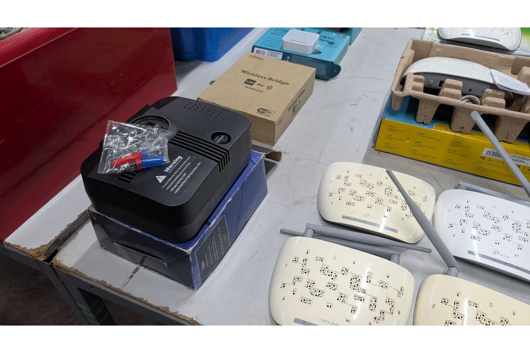 The contents of a Table of Assorted Switches, Routers and other Networking Items. - Image 13 of 19