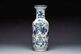 A Chinese doucai and famille rose rouleau vase with figures among antiquities, 19th C.