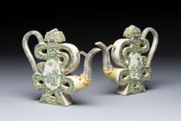 A pair of Chinese verte biscuit 'Shou' wine ewers, 19th C.