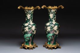A massive pair of gilt-bronze-mounted famille noire style vases, Samson, Paris, 19th C.