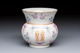 A Chinese famille rose 'Butterflies' spittoon, Tongzhi mark and of the period